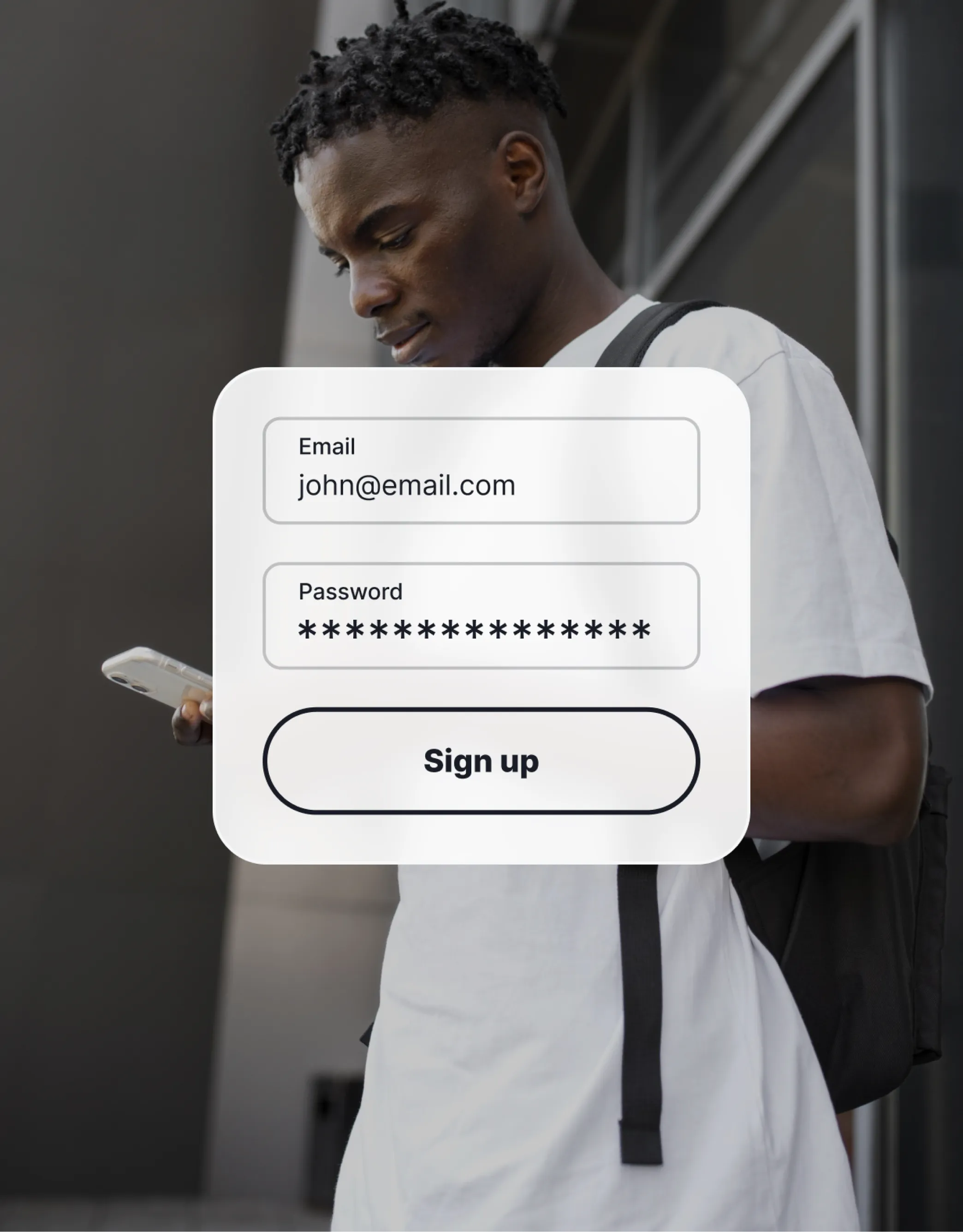 Man signing up for an account on a mobile device, showing a simple email and password input form